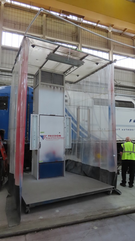 Paint booth that can move along the locomotive.